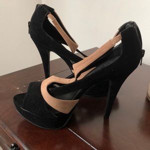 Black and Tan strapping pumps
